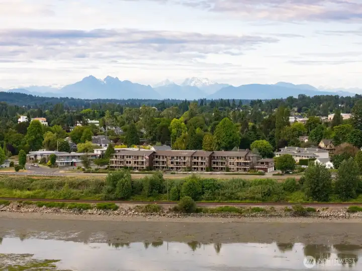 Welcome to Seascape Condos at 1300 Peace Portal Way Unit 106.  This ground floor corner unit sits above Drayton Harbor with stunning views in a wonderful location.