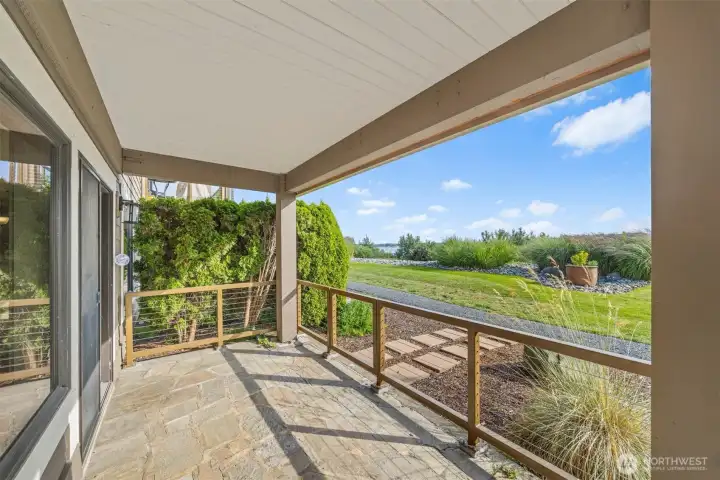 Covered patio to enjoy views and sunsets year round.