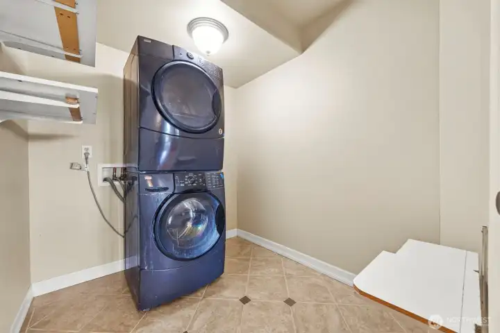 Good sized utility room with extra storage space.