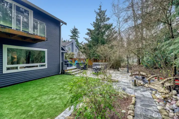 Water feature flows throughout the back yard