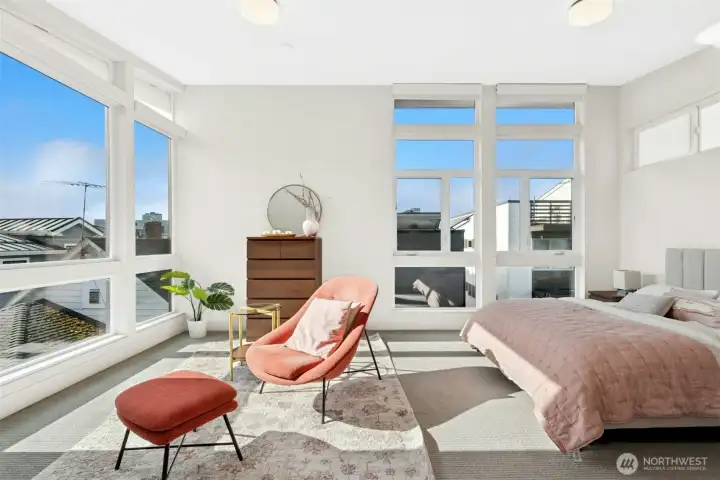 Primary suite is a private retreat with abundant natural light and a spa-inspired bath