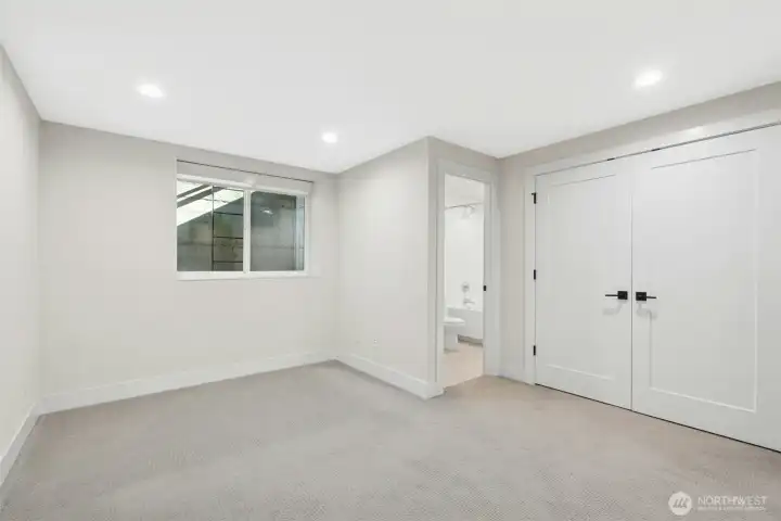 Lower-level ADU-ready suite with full bath offers flexibility for guests, multigenerational living, or rental potential