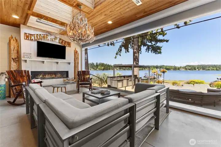 Attached Sunroom with Phantom screens – gas fireplace