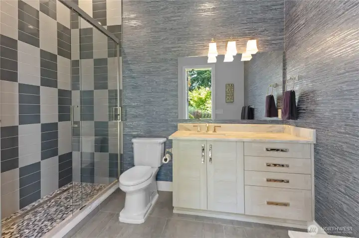 Attached exterior entrance bathroom