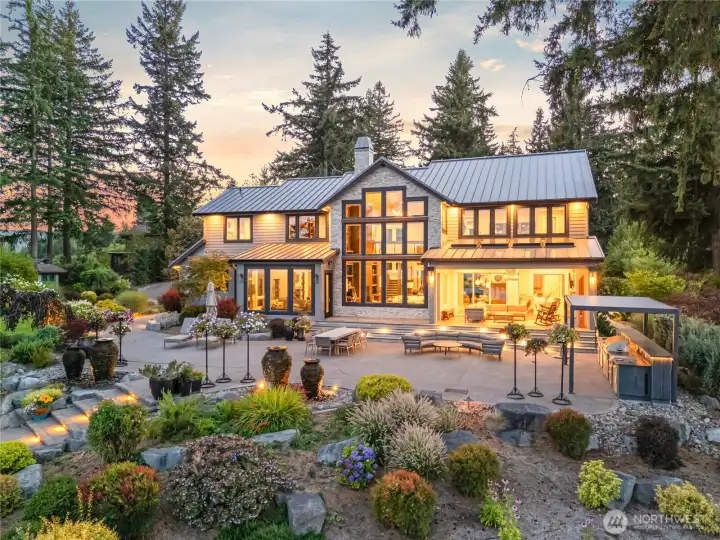 Custom landscaping with lighting – four waterfall urns- two outdoor fire-pits