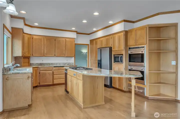 Island kitchen with stainless steel appliances
