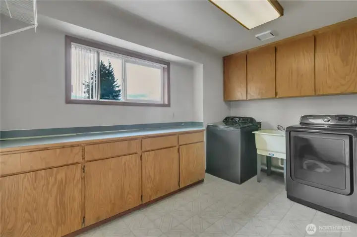 Upstairs laundry with folding center