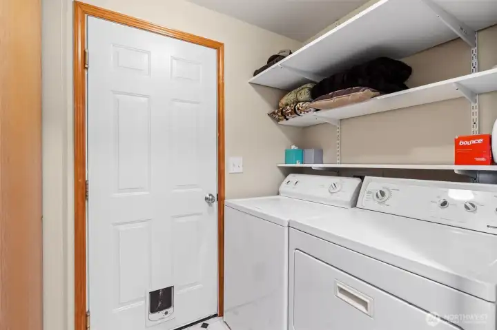 Laundry room with garage access
