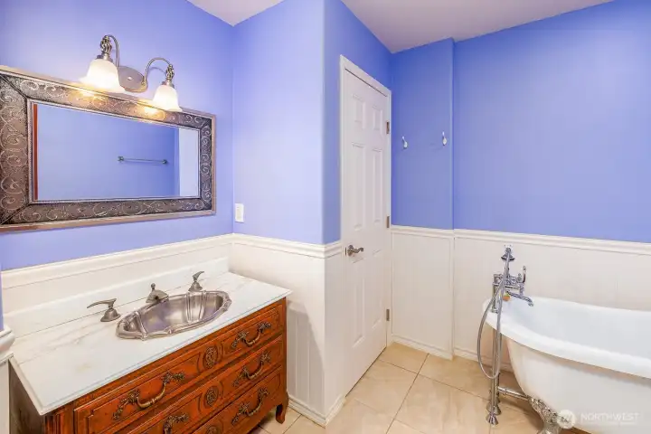 Upper level bathroom with soaking tub.