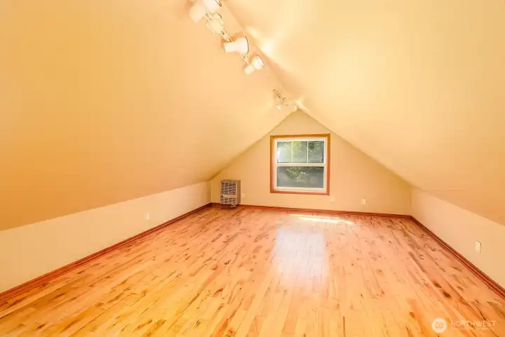 Upper level room for crafts, storage.