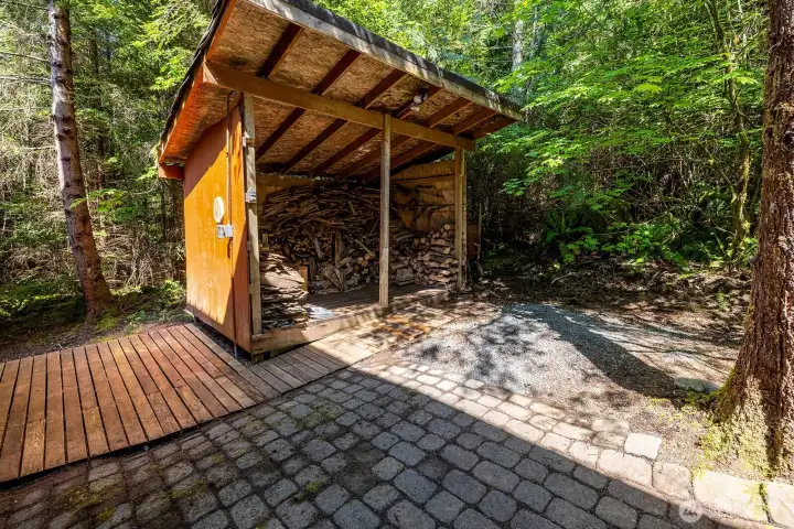 Wood shed comes stocked.