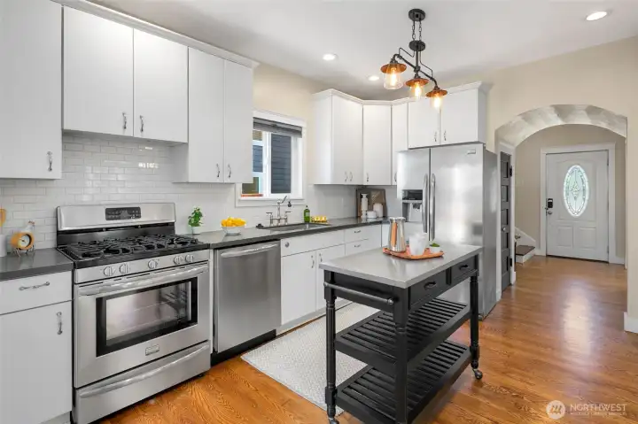 Remodeled kitchen with quartz counters, updated cabinets and stainless appliances. Remodeled kitchen with quartz counters, updated cabinets and stainless appliances.