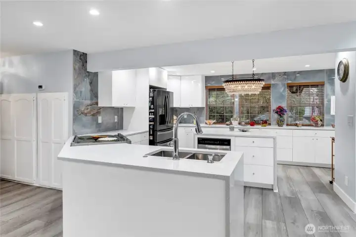 Tons of counter space and island that is fully walk around