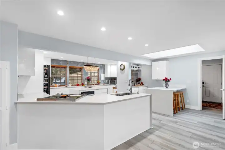 View as you walk in from the Family room into the kitchen.Garage and Laundry room through the far door