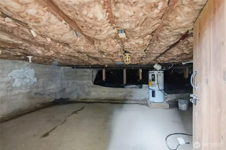 basement with hot water tank and ample storage basement with hot water tank and ample storage
