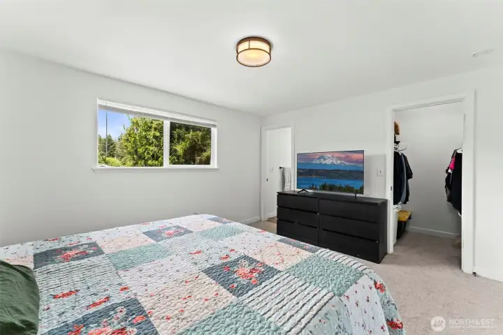 Walk-in closet off primary bedroom