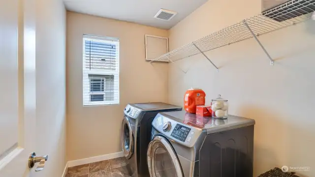 Conveniently located laundry room upstairs.