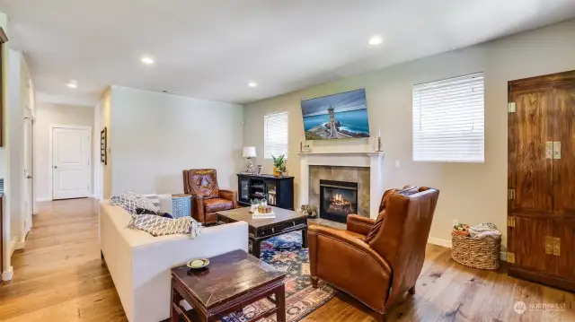 Enter the home into your open living with cozy gas fireplace.