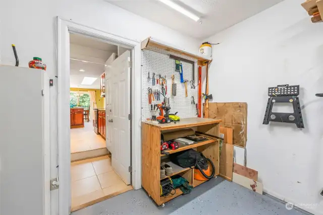 Even the garage has been carefully thought out and organized! Note the expoxy floors and pegboards!