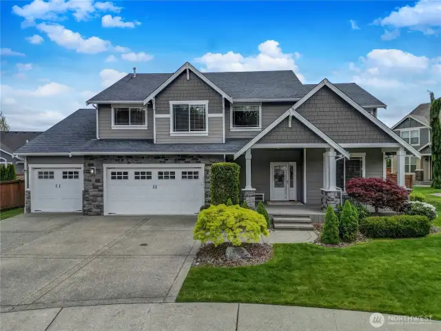 Breathtaking Mt. Rainier views in this stunning Southwood neighborhood home in Sunrise! Built in 2011 with current upgrades.  This 4-bedroom + den, 2 + 3/4 bath beauty offers 3,347 SF of refined living space.  Entertain with ease in the expansive great room and chef’s kitchen featuring stainless steel appliances, gas cooking, and an oversized, unencumbered “working” island.  The massive 5-car garage (1,275 SF!) includes backyard, garage door access, utility sink, work bench and lots of shelving for storage.  Upstairs is a huge a bonus flex-space . Use for your recreation room or home theater.  Relax in the luxurious primary suite with 5-piece bath, soaking tub, walk-in closet, and endless mountain views.     Enjoy a large, fenced backyard, a covered entertainment patio, and access to Sunrise amenities—parks, tennis courts, and more. Prime South Hill location, Puyallup Schools—this is the one!