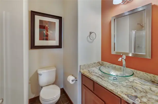 Main Floor Guest bath is a 3/4 bath. So great to have a shower on the main floor! Especially, if you decide to use the den as a guest bedroom.