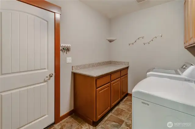 Laundry room right where it's supposed to be, between the garage and the kitchen! This way it serves as a mudroom, too!