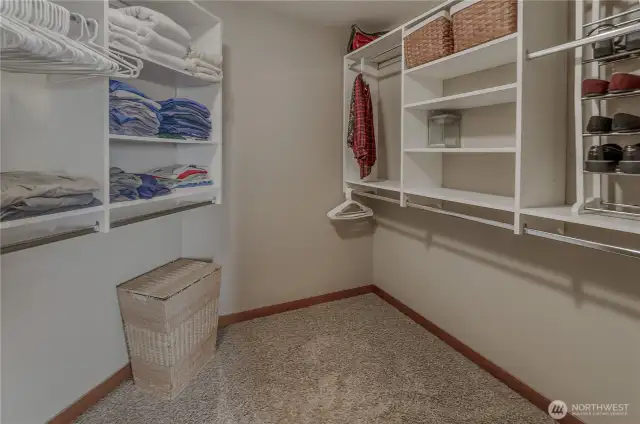 Lots of storage in the primary bedroom's walk-in closet