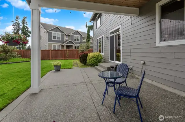 Covered patio is off the kitchen for easy pass through, if desired.