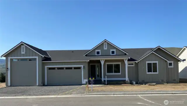 Professional landscaping front and back on irrigation coming soon.