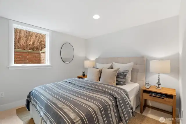 The fifth bedroom, located on the lower level, offers a private and comfortable retreat—ideal for an au pair, live-in nanny, or extended-stay guests.