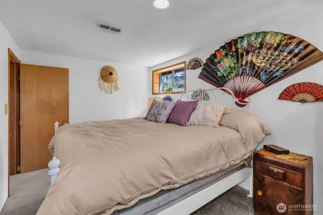 Lower level bedroom could be considered a secondary primary bedroom