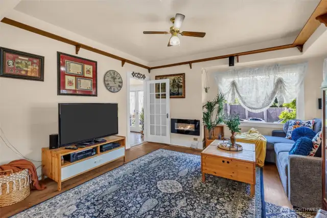 Light and bright living room with electric fireplace