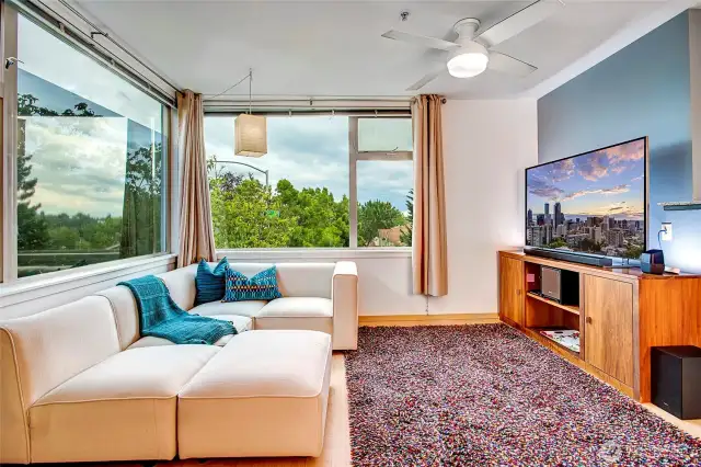 Lots of natural light streams through corner windows.