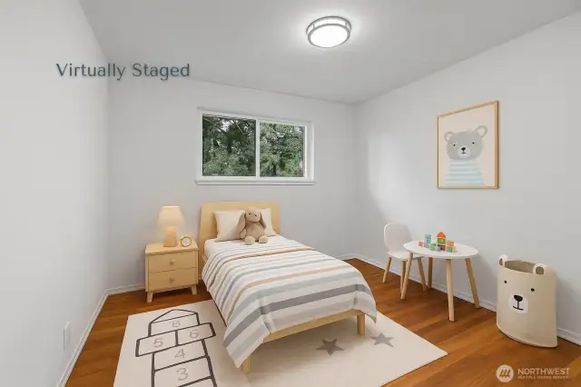 Main level bedroom 3, virtually staged
