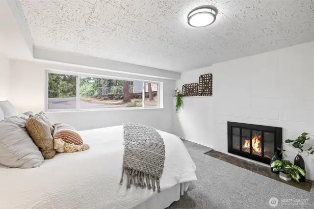 ADU primary bedroom w/fireplace