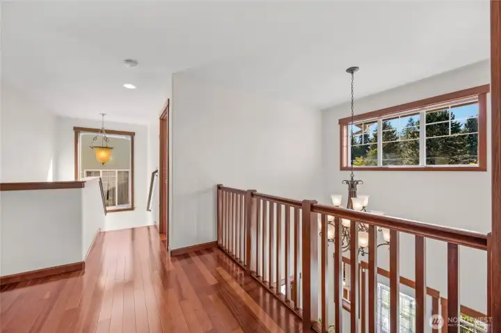 3RD FLOOR HALLWAY W/DRAMITIC VIEW TO LOWER FLOOR