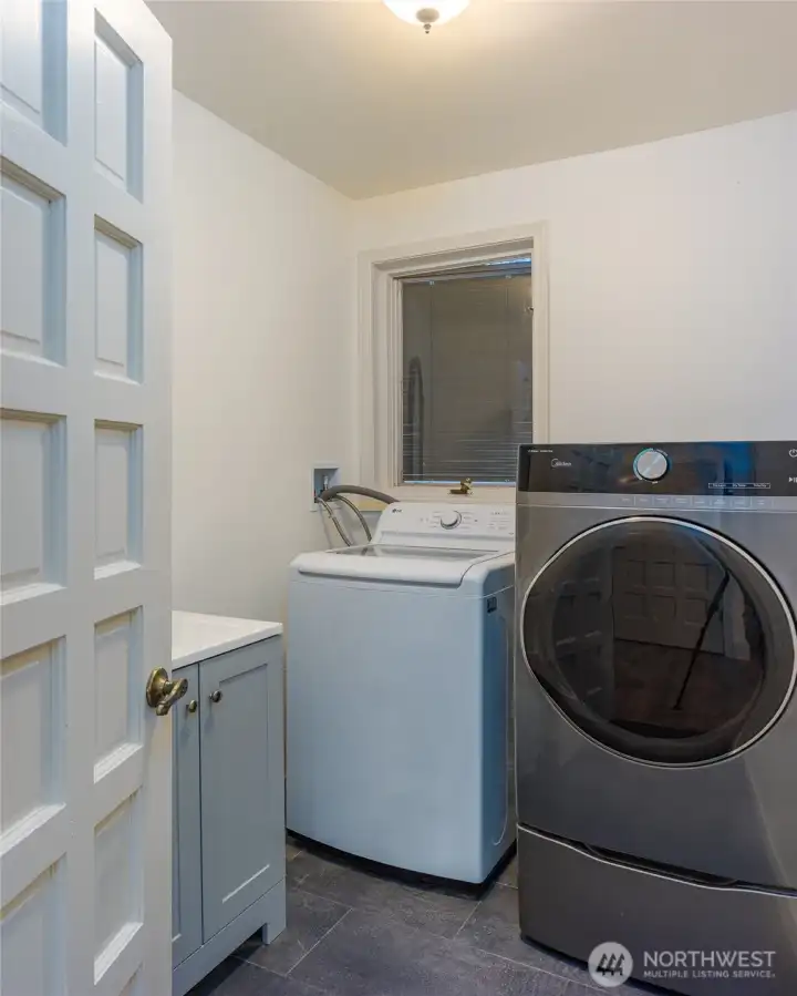 Main floor half bath and washer and dryer