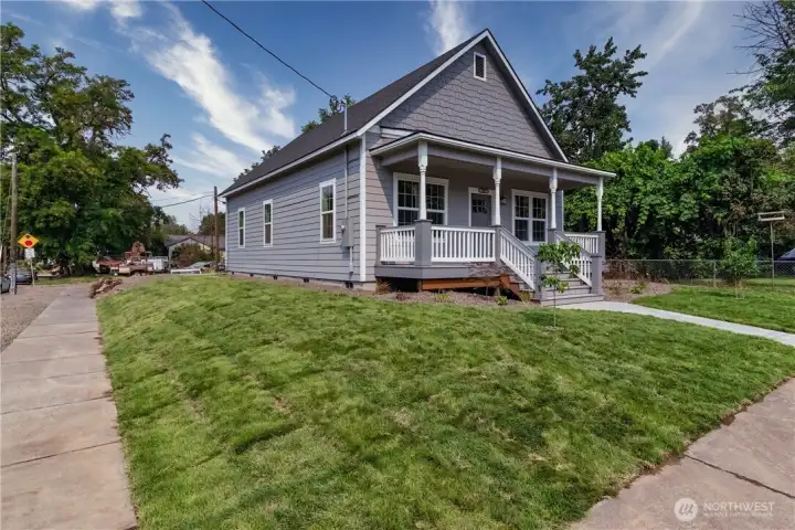 Sprinkling system, landscaping and sod on a corner lot