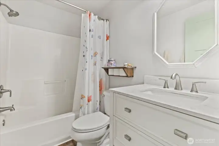 Hall full guest bath w/ updated vanity.