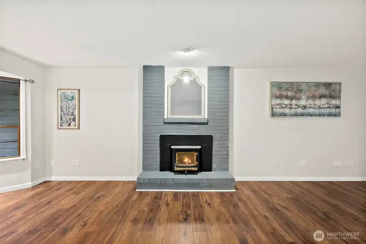 Cozy up to the brick-lined wood burning fireplace during these cold nights and mornings.