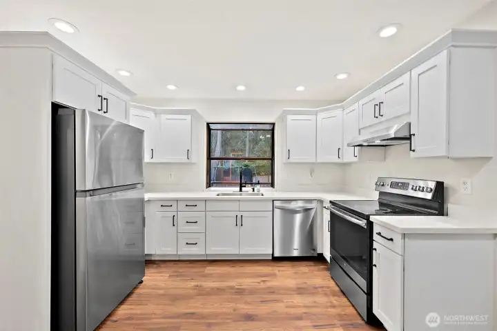 Updated kitchen with stainless appliances