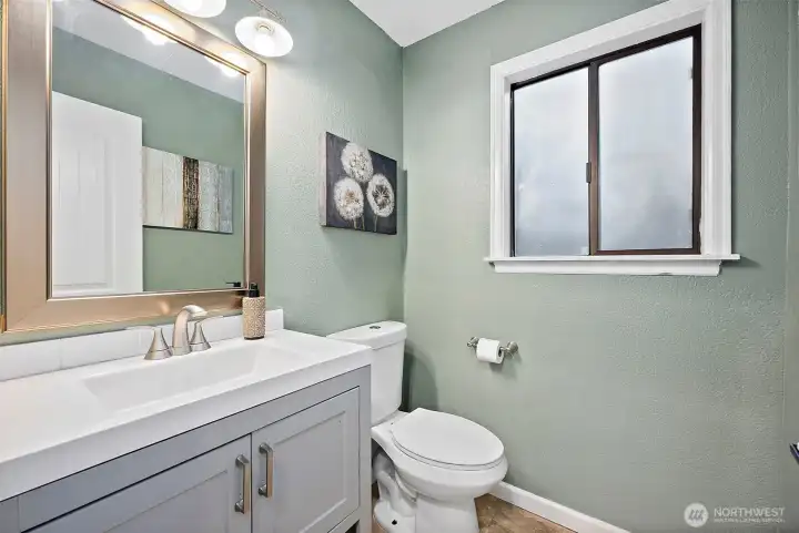1/2 bath on main floor with updated vanity