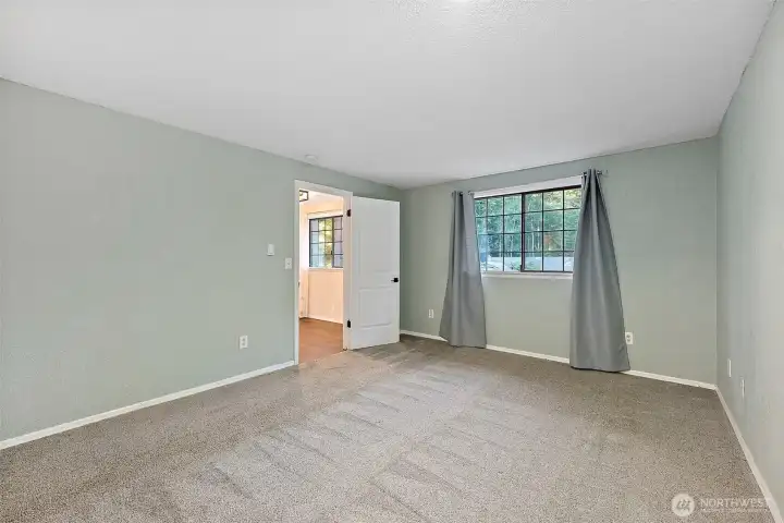 Primary Bedroom looking out to hallway door