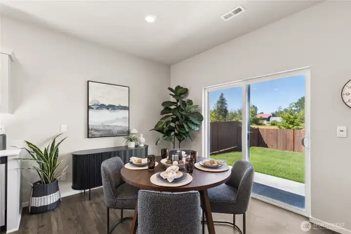 Dining room space to enjoy hosting. Actual home is under construction. Colors, materials, and features may vary. See site agent for details.