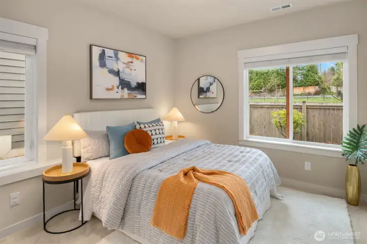 Large lower level guest suite is bright and airy.