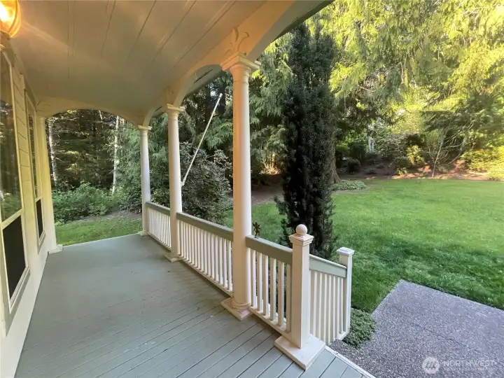 One side of deck toward the 1.25 acre purchased offers total privacy~