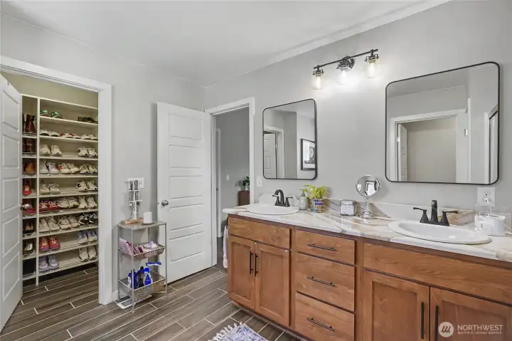 Primary Bathroom (looking into closet and back into the bedroom)