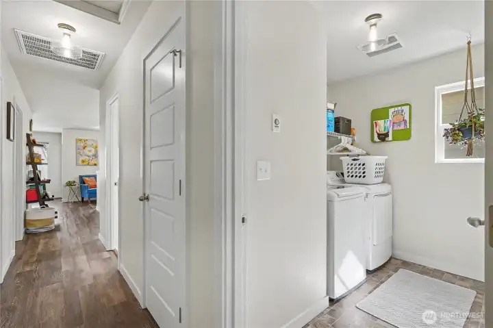 Utility room (upstairs looking from primary bedroom towards the loft area)