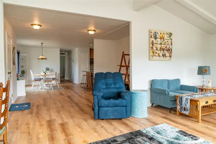 Living room looking towards dining/kitchen/hallway.