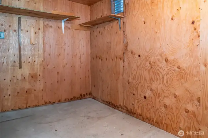 Storage room in carport.
